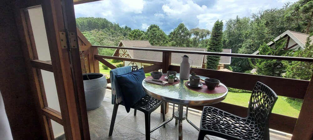 Фото Dúplex Luxo com Piscina Aquecida, Lareira e Wifi