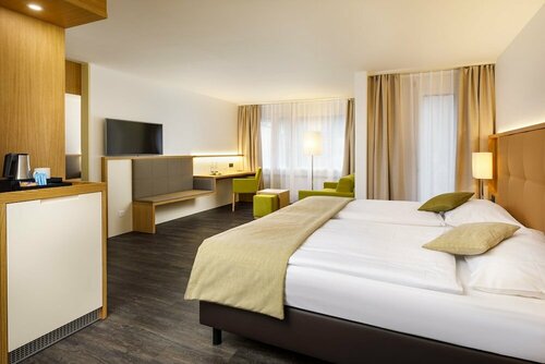 Гостиница Ramada by Wyndham Baden Hotel du Parc в Бадене