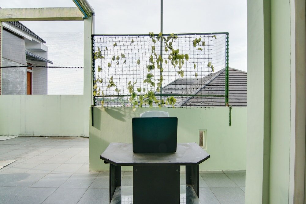 Фото Spot On 91858 Raja Homestay Syariah