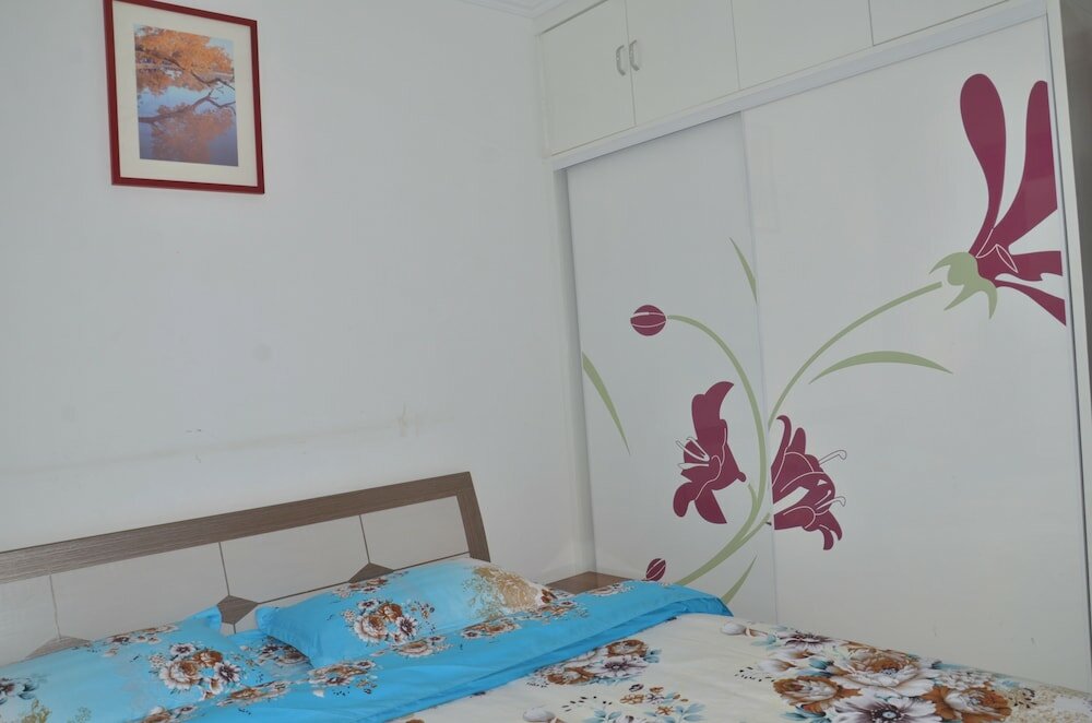 Фото Lanzhou Longshang Mingzhu Apartment Two-bedroom suite