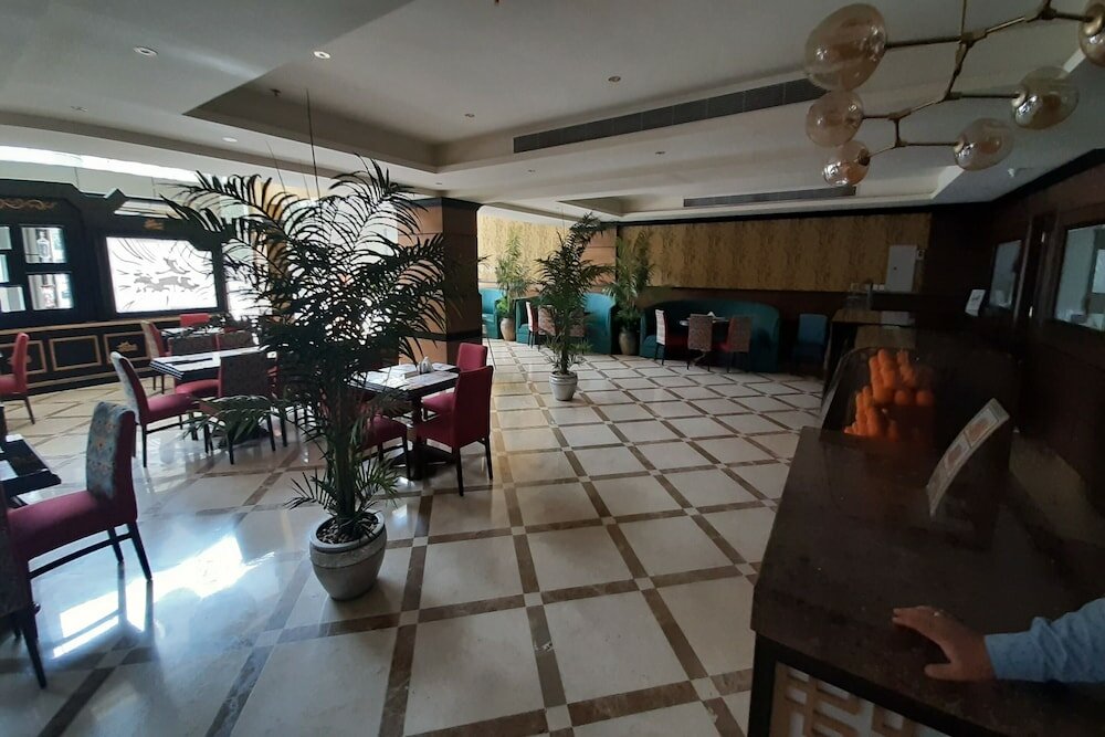 Фото The Blue Rose Hotel - الورده الزرقاء للوحدات السكنيه