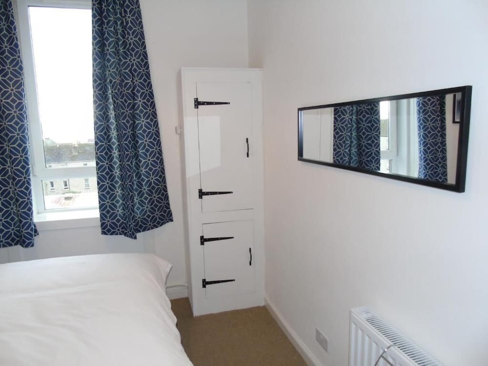 Фото Snug - Sealladh Mara Apartment