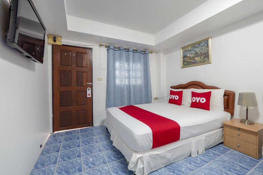 Фото Oyo 1165 Uma Apartment