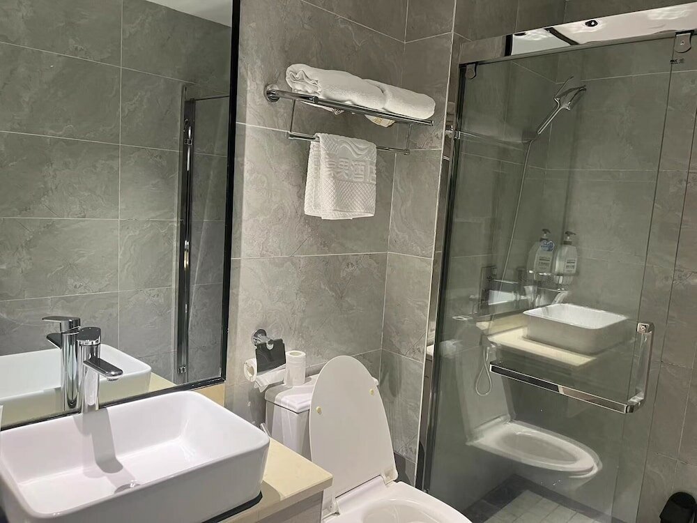 Фото Yiwu Manting City Hotel