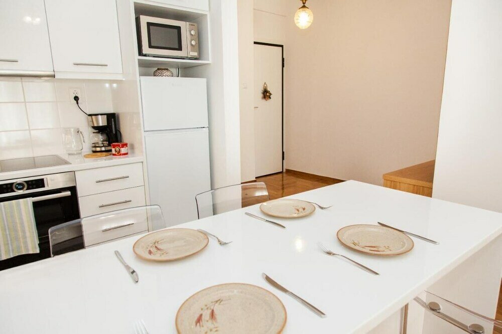 Фото Cozy apt with Lycabettus View