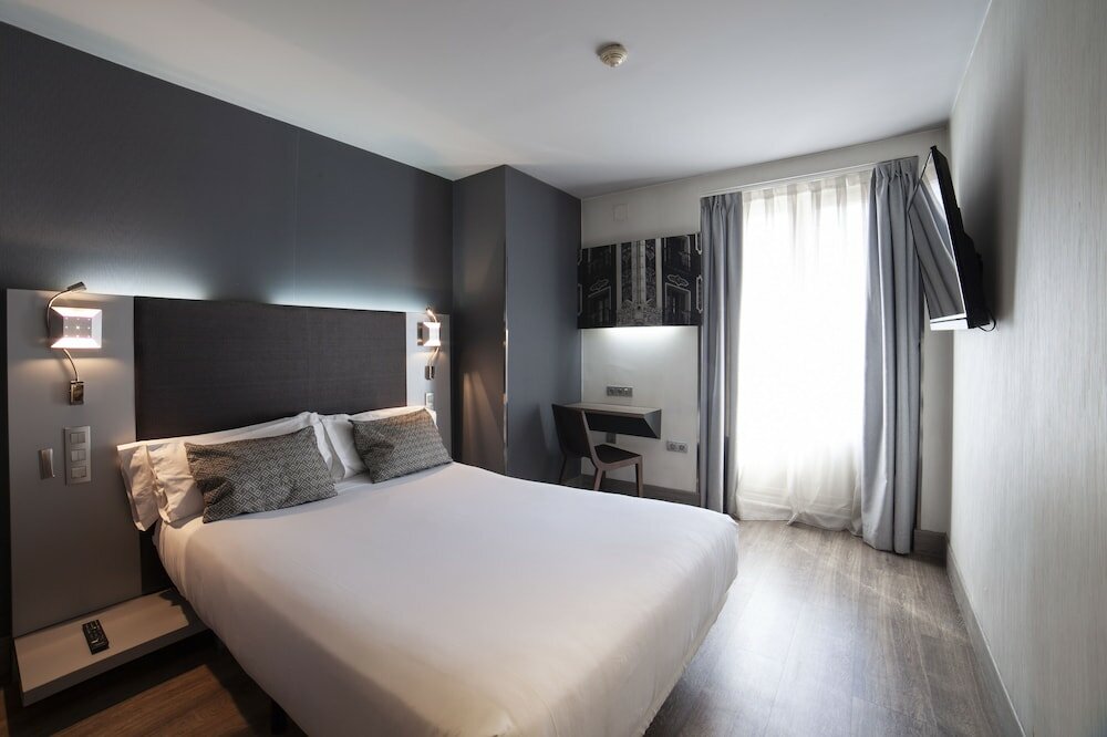 Фото Petit Palace Plaza España