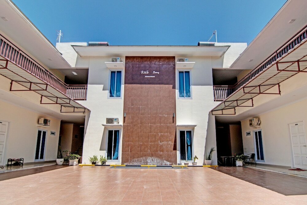 Фото Oyo 91269 R&s Living Residence