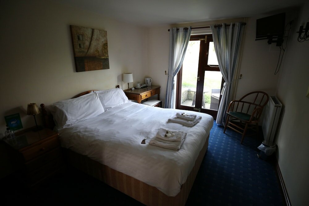 Фото Oyo Ye Olde Bowling Green Inn