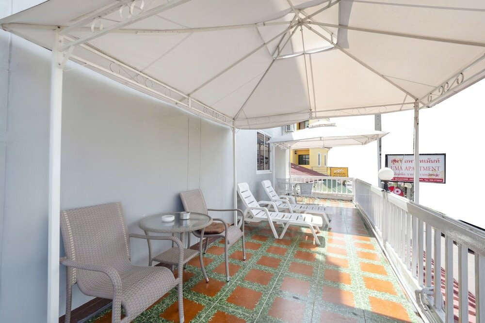 Фото Oyo 1165 Uma Apartment