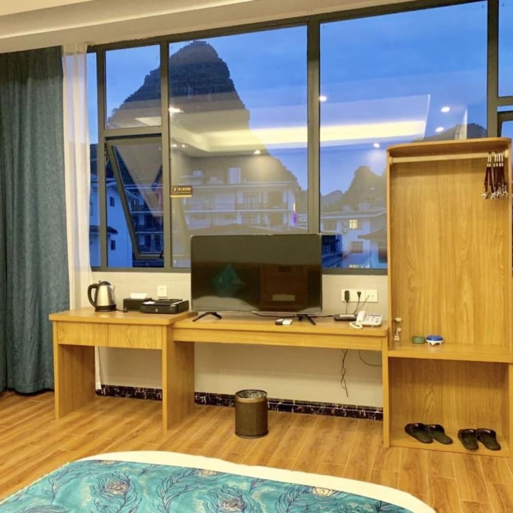 Фото Yangshuo Qingyunge Hotel