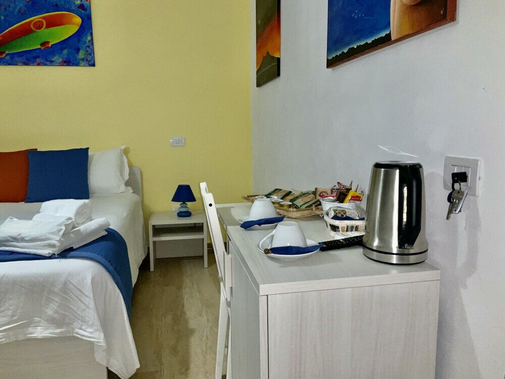 Фото A Room de Scugnizzi