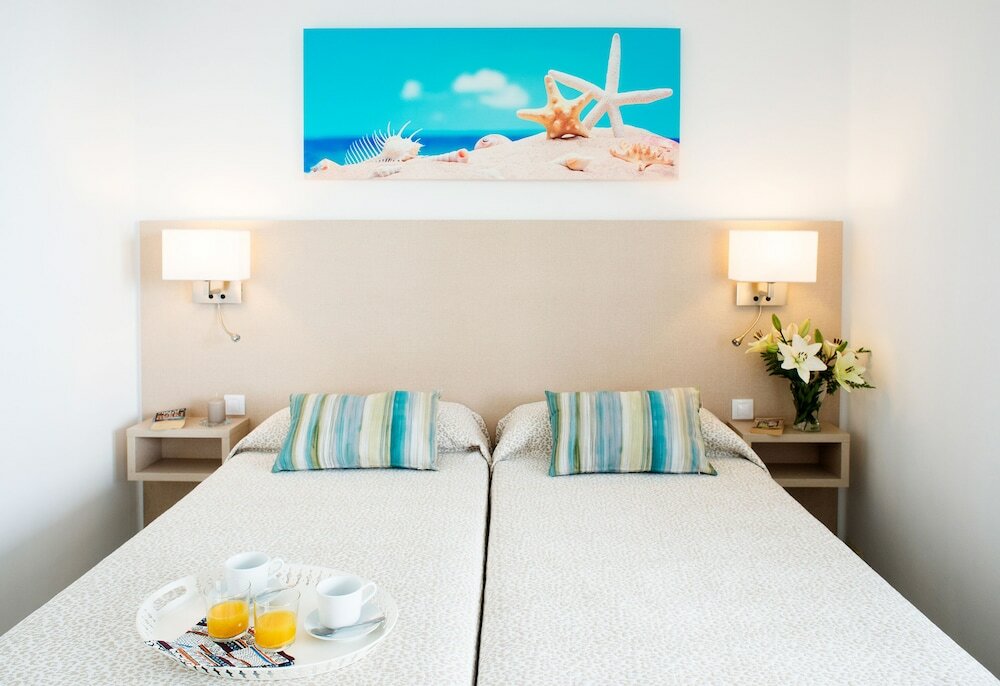 Фото Apartamentos Livvo Oasis