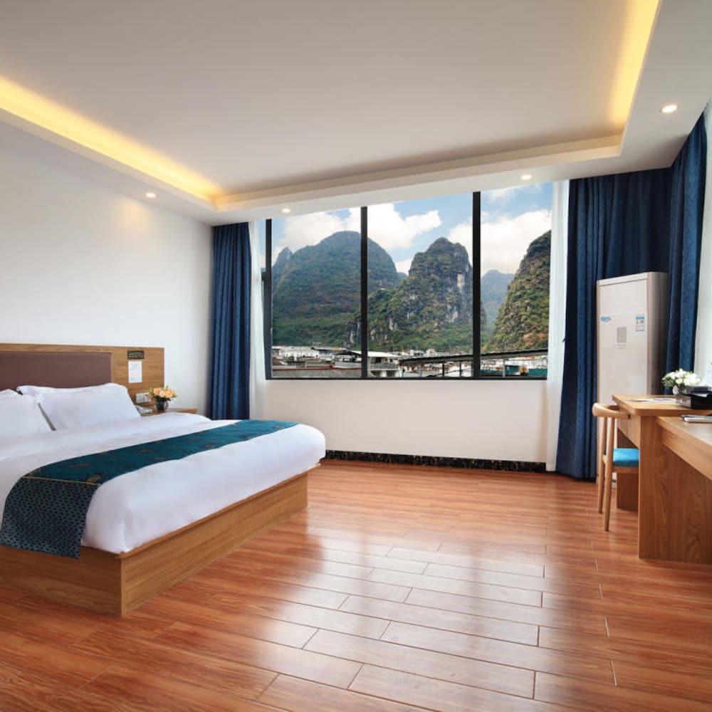 Фото Yangshuo Qingyunge Hotel