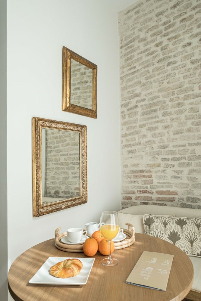 Фото Mylu Suites by Puerta Catedral