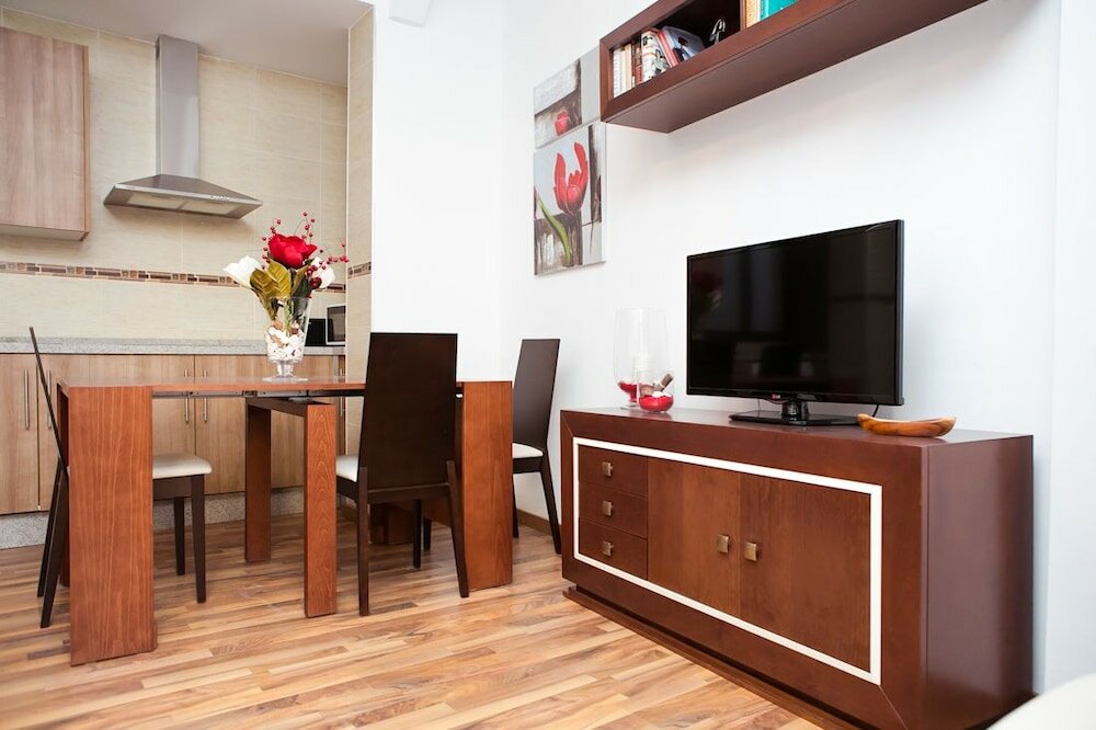 Фото Apartamentos Casa de la Lonja