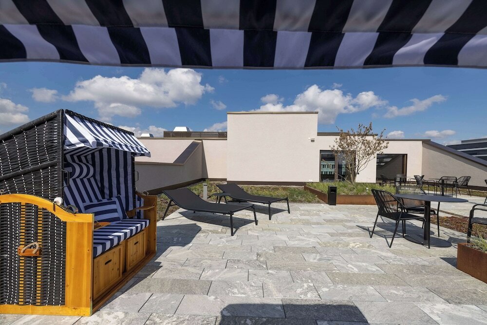 Фото Radisson Hotel & Suites Zurich 