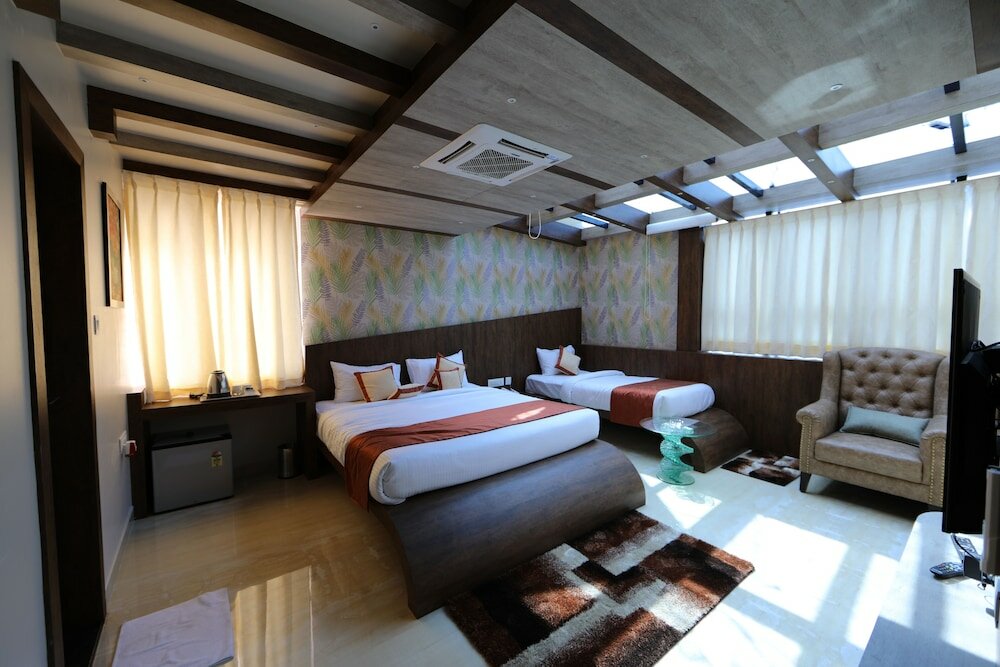 Фото Aaccord Suites Inn