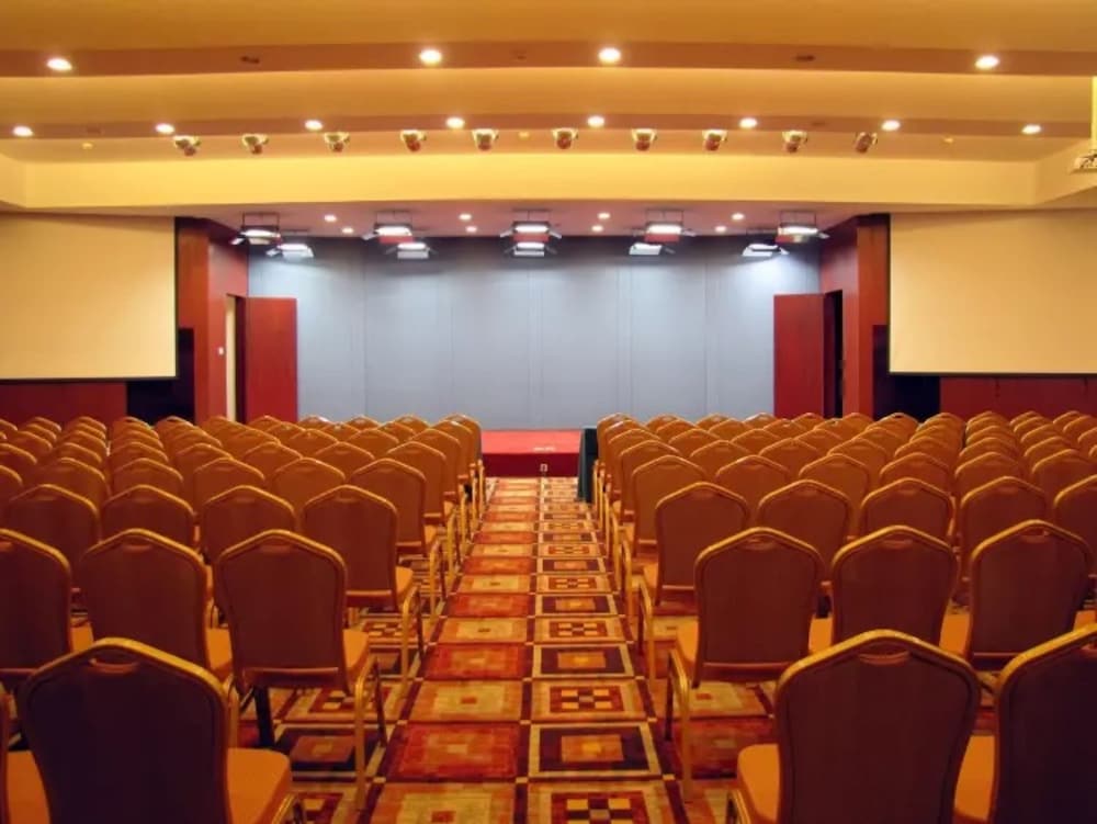 Фото Junyi Wangchao Hotel