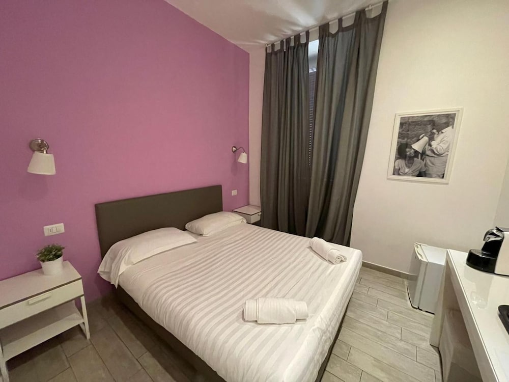 Фото Relais Merulana Guesthouse