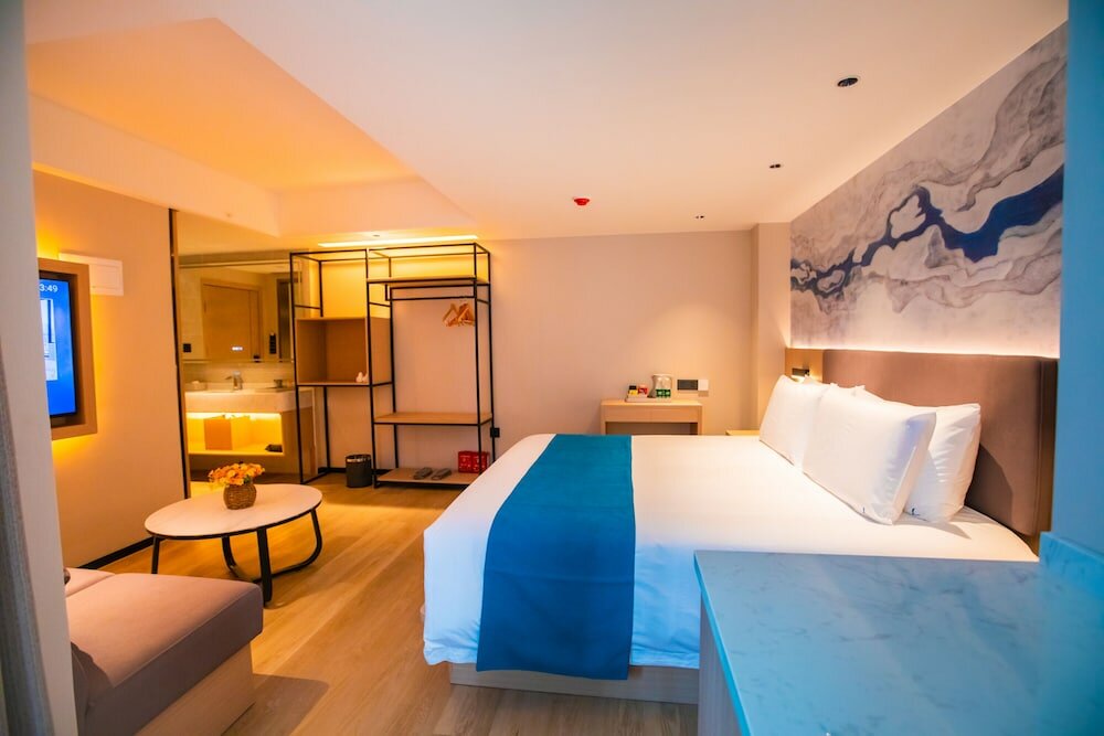 Фото Naive L Executive Apartments Coast City