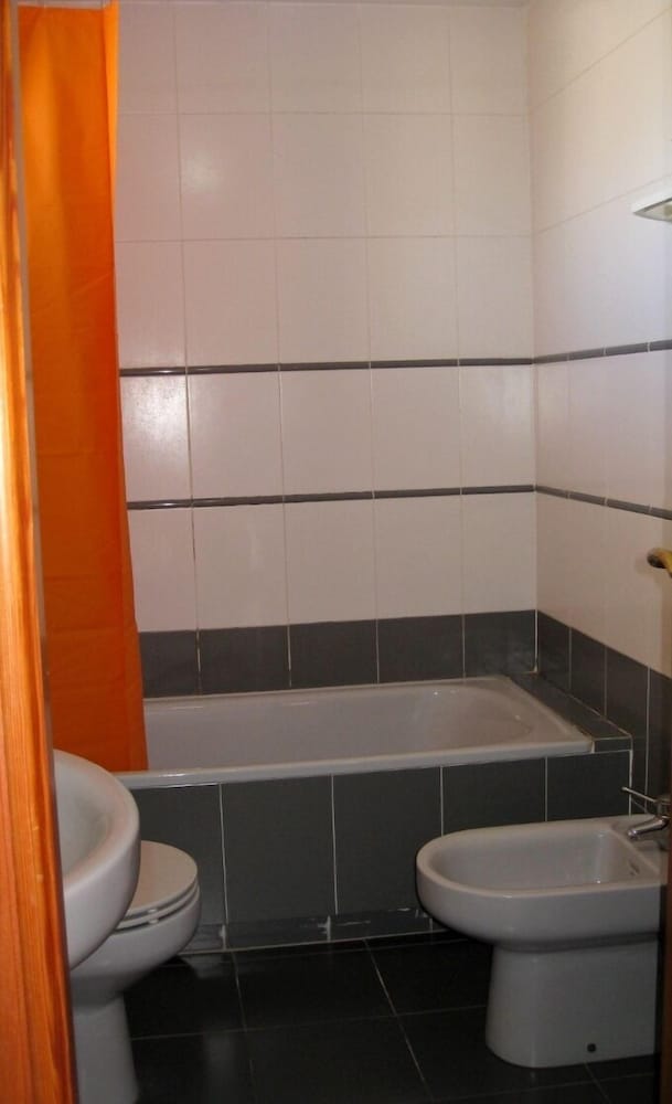 Фото Apartamentos la Reina