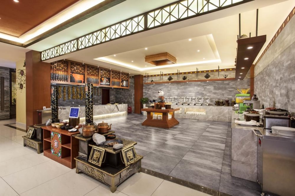 Фото Ramada Encore DaochengYading