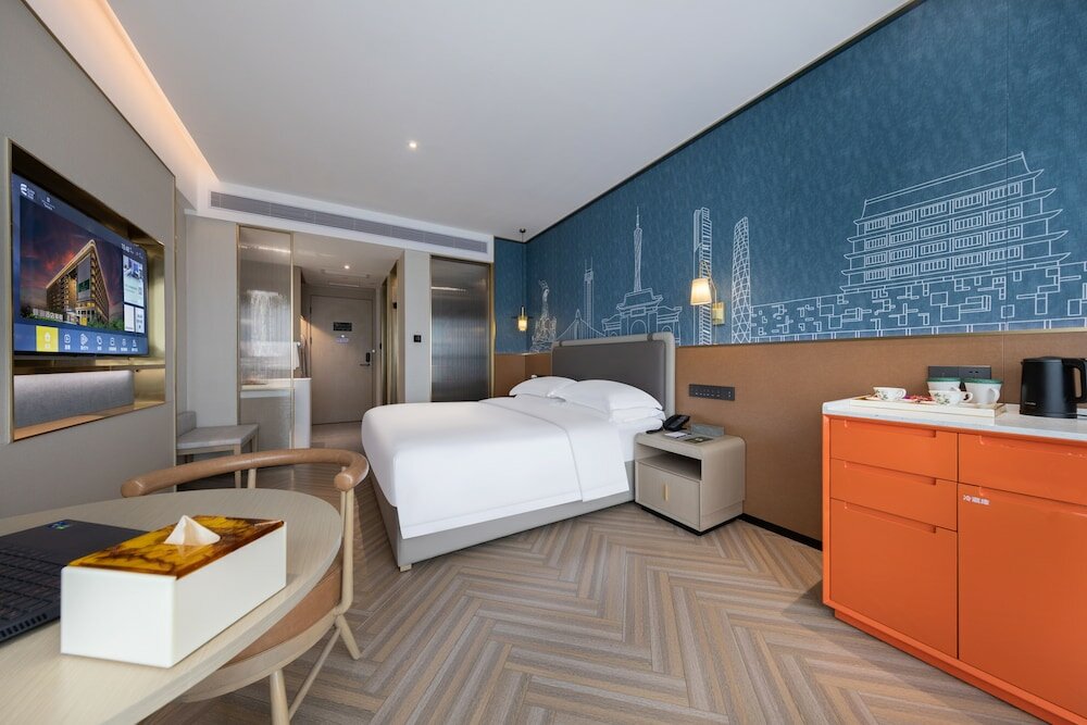 Фото Gz Baiyun Airport MeHood Liz Hotel T1