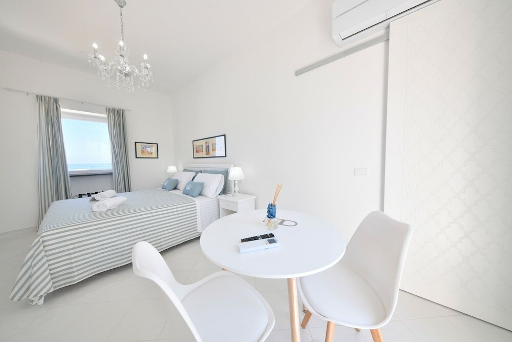 Фото King Suite - Luxury Rooms