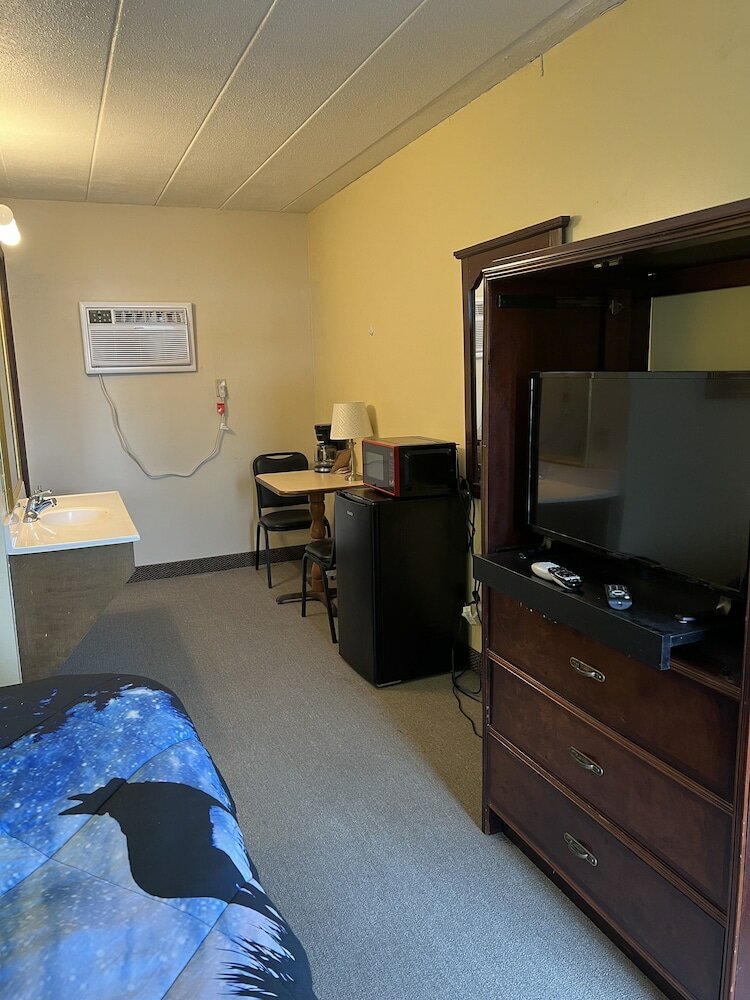 Фото Motel Boutique by Wolf Inn