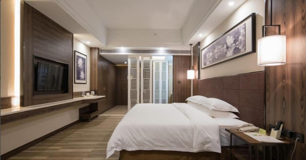 Фото Auden International Hotel