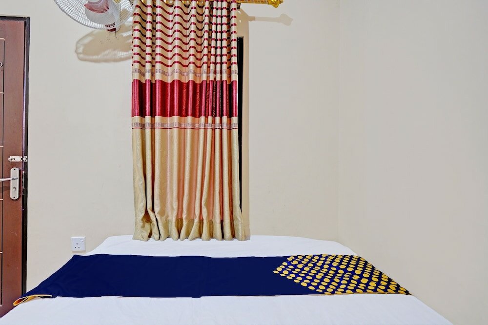 Фото Spot On 92527 Penginapan Kangean Syariah