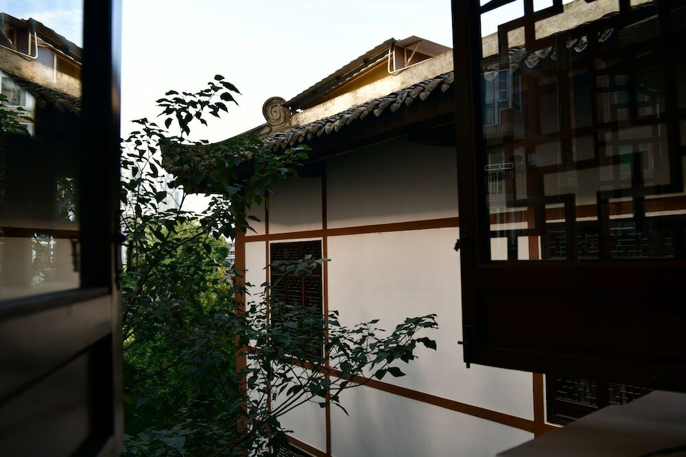 Фото Xishu Garden Inn