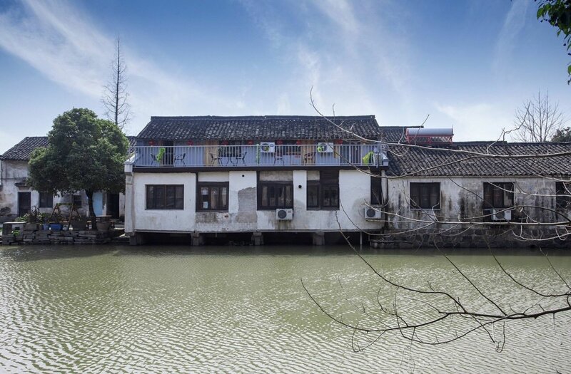 Гостиница Wuzhen Helan Bridge Inn