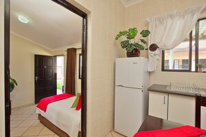 Гостиница Gecko Inn Guest House