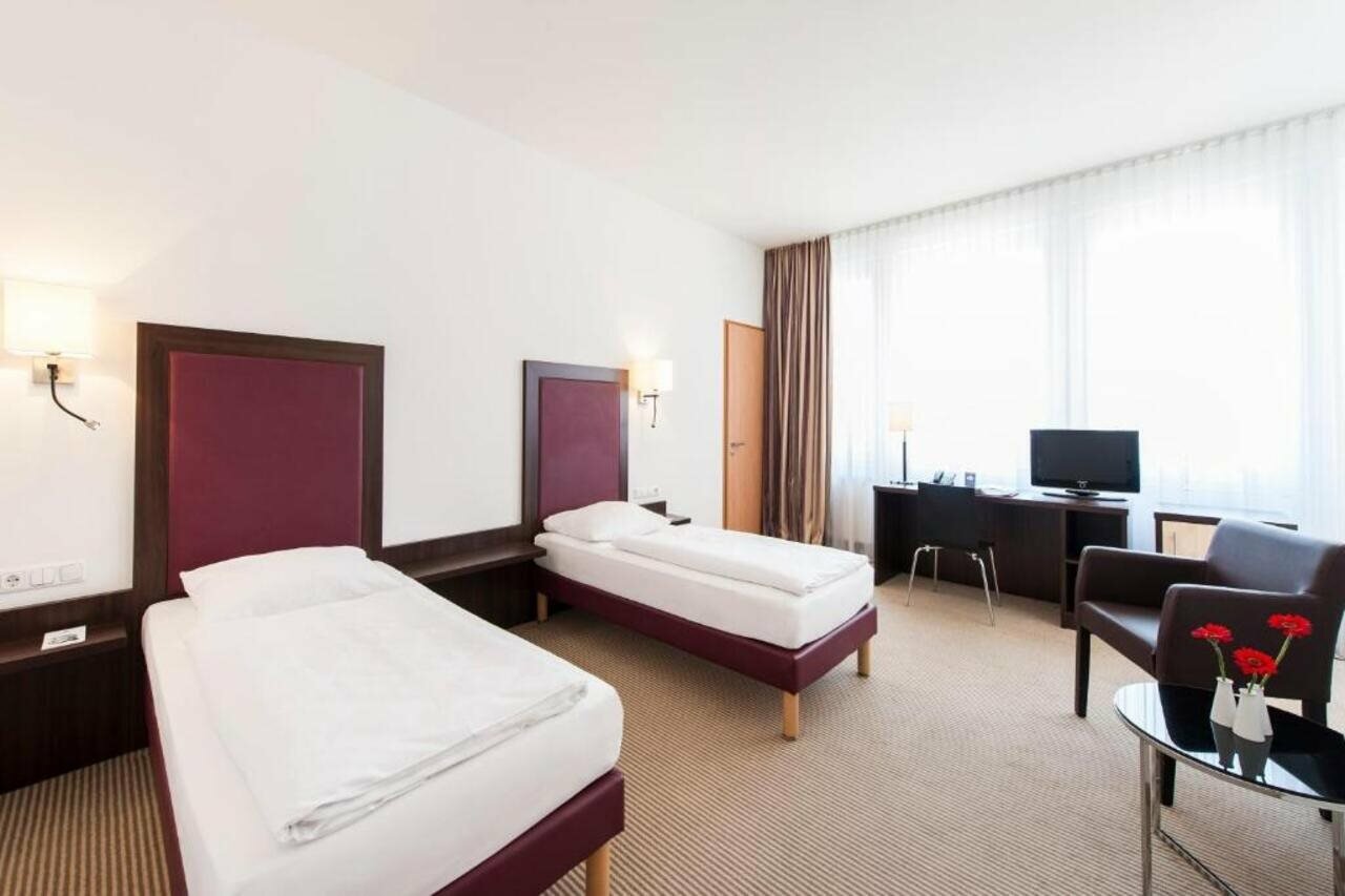 Фото Acom-Hotel Munich