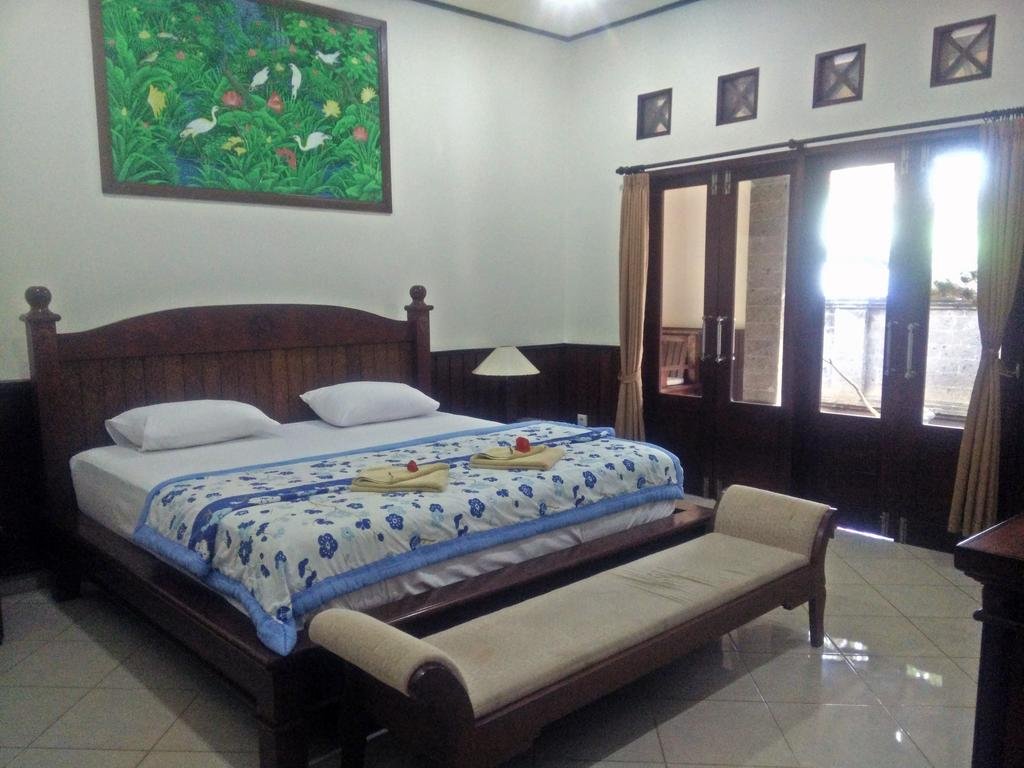 Фото Puri Rai Hotel