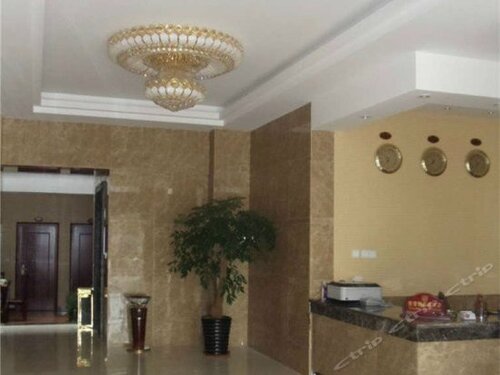 Гостиница Four Seasons Holiday Grand Hotel в Лицзяне