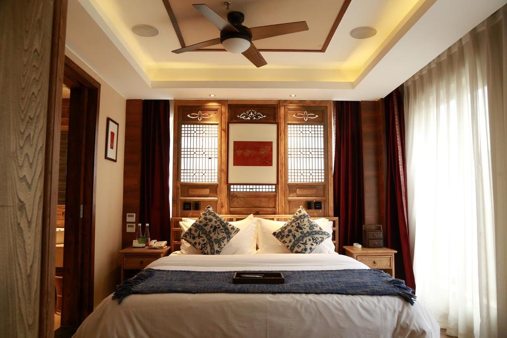 Фото Chengdu Chuanjia Heyuan Theme Hotel