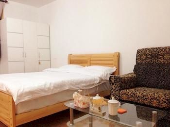 Фото Yuelai Apartment Hotel