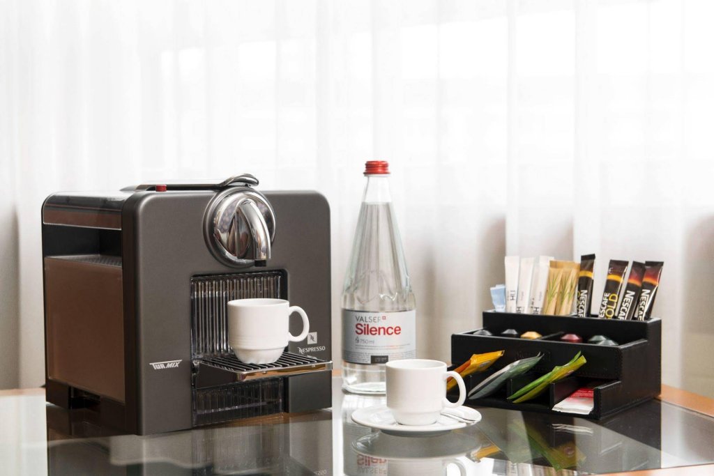 Фото Nh Fribourg Hotel