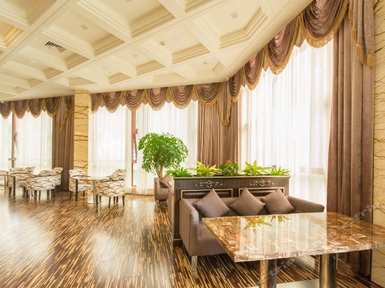 Фото Zhenhao Holiday Hotel