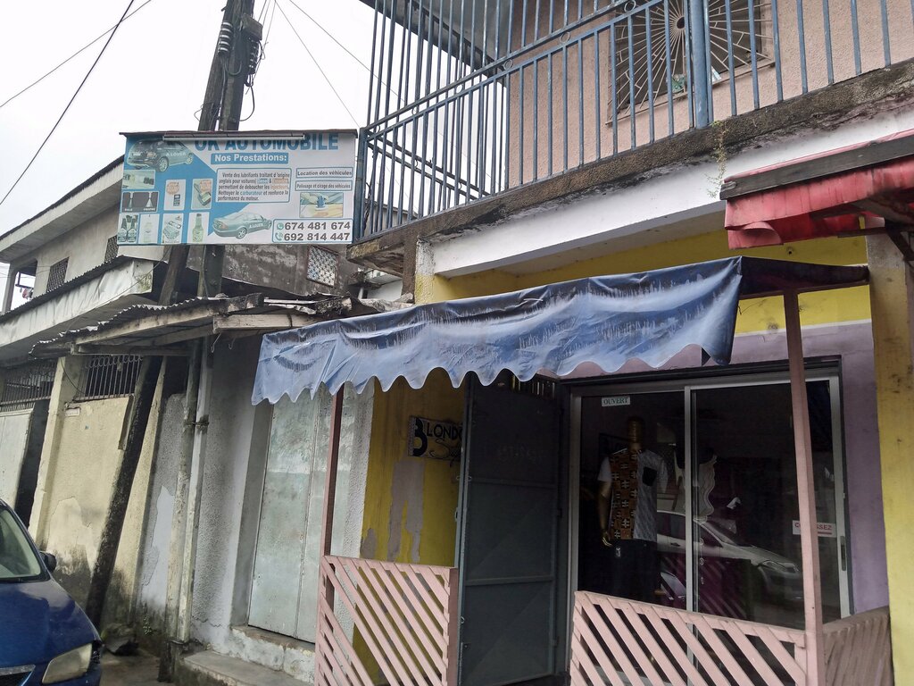 Dry cleaning Oke Pressing, Douala, photo