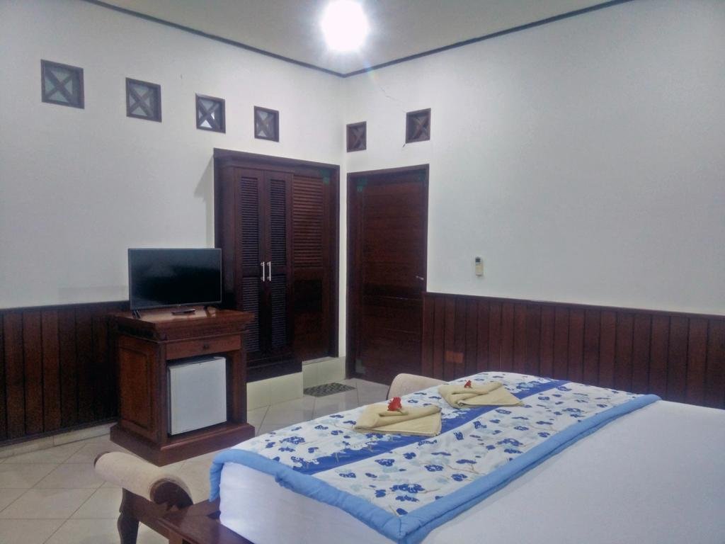 Фото Puri Rai Hotel