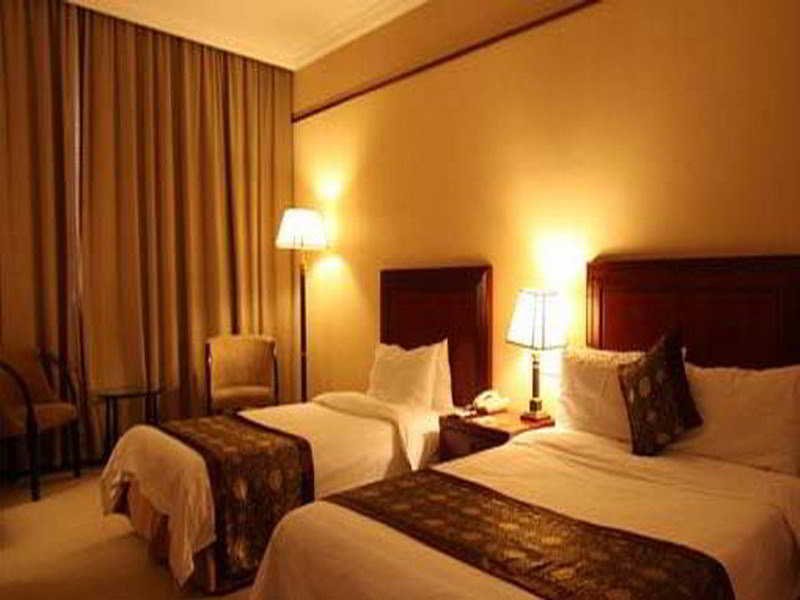 Фото Yashidu Suites Hotel