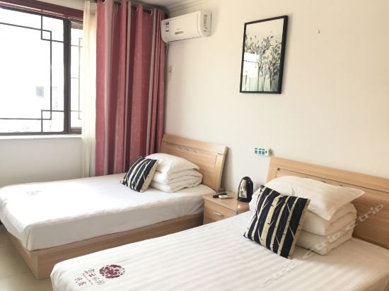 Фото Gubei Water Town Wanli Heyuan Farmstay