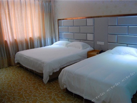 Фото Xindu Business Hotel