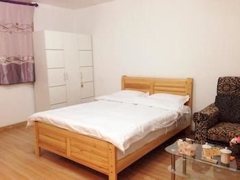 Фото Yuelai Apartment Hotel