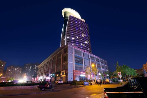 Гостиница Qingdao Great Tang Harvest Hotel в Циндао