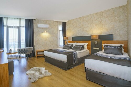 Гостиница Qinn Hotel в Муратпаше