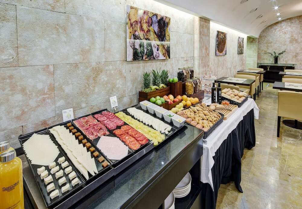 Фото Sercotel Puerta de la Catedral